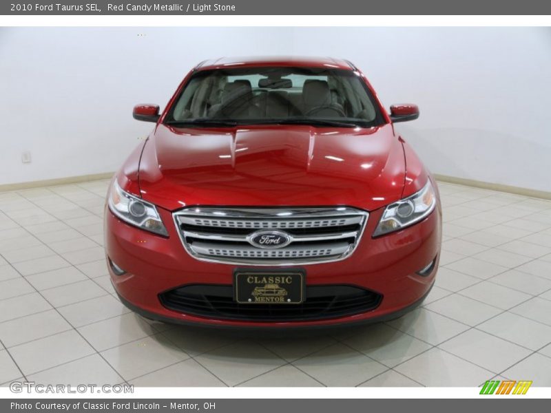 Red Candy Metallic / Light Stone 2010 Ford Taurus SEL