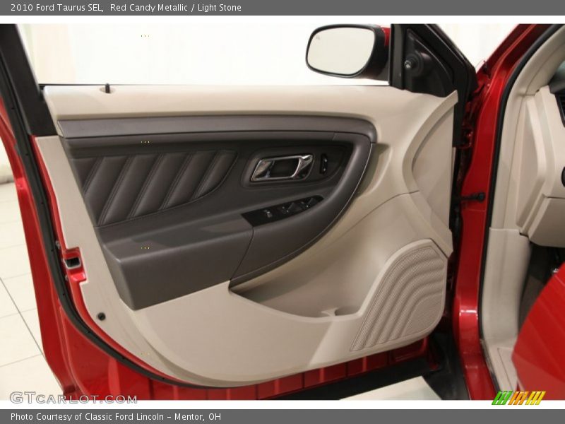 Red Candy Metallic / Light Stone 2010 Ford Taurus SEL