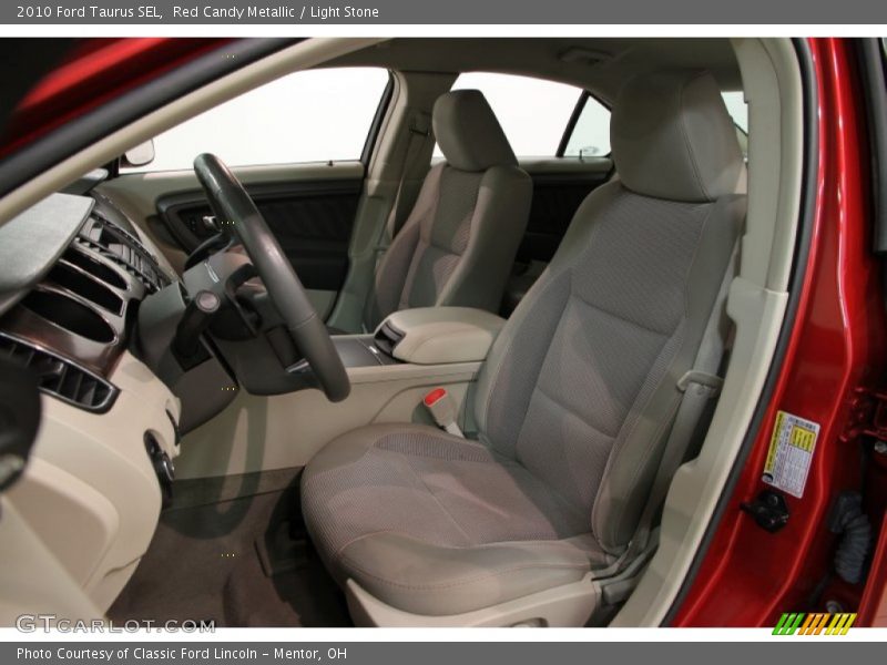 Red Candy Metallic / Light Stone 2010 Ford Taurus SEL