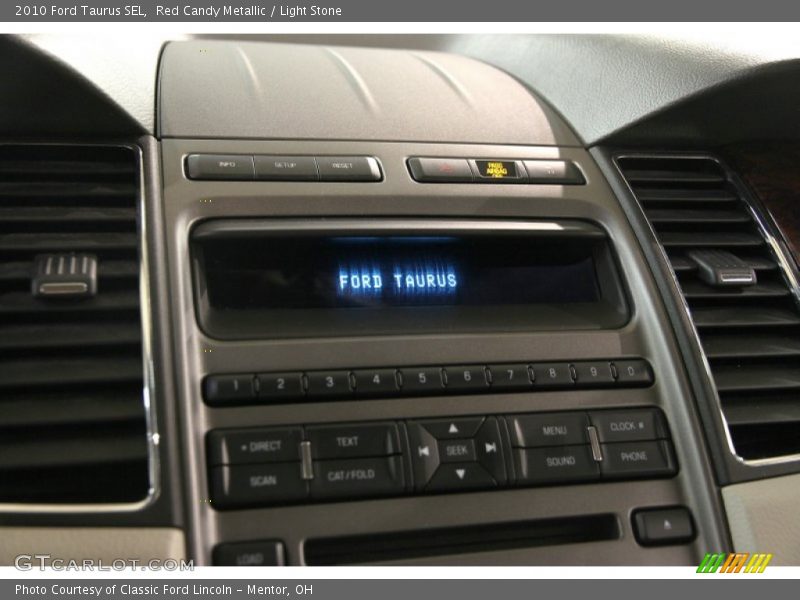 Red Candy Metallic / Light Stone 2010 Ford Taurus SEL