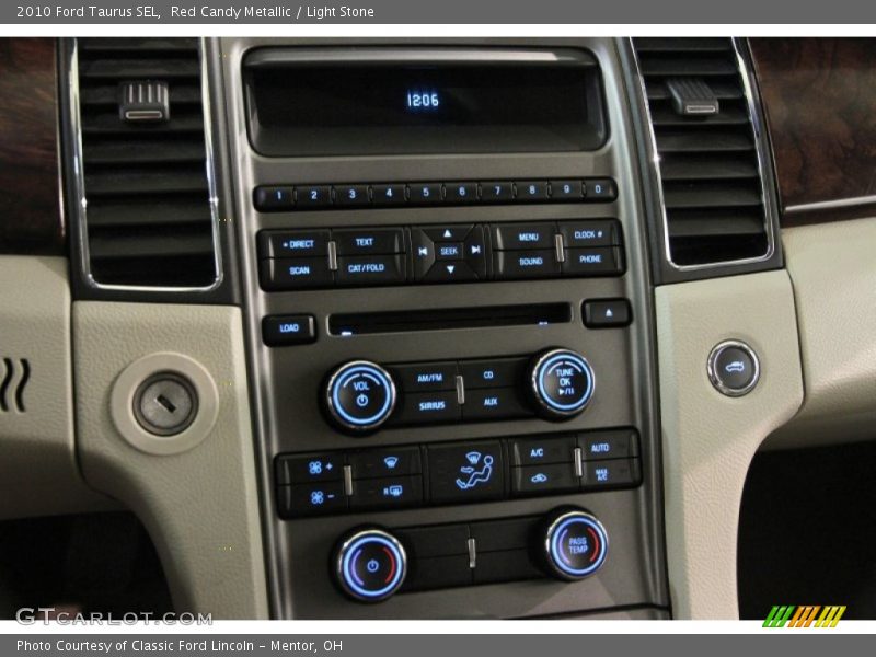 Red Candy Metallic / Light Stone 2010 Ford Taurus SEL
