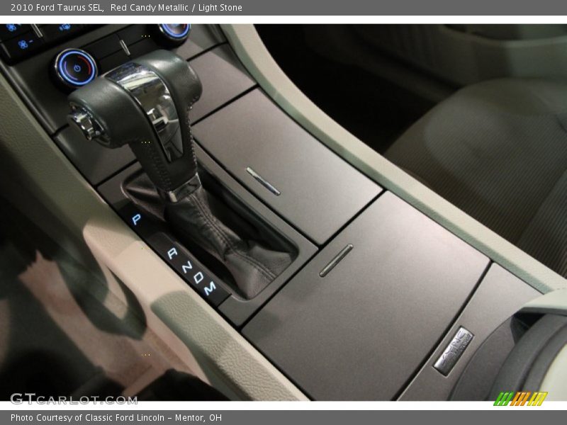 Red Candy Metallic / Light Stone 2010 Ford Taurus SEL