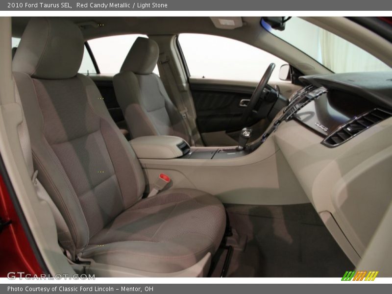 Red Candy Metallic / Light Stone 2010 Ford Taurus SEL
