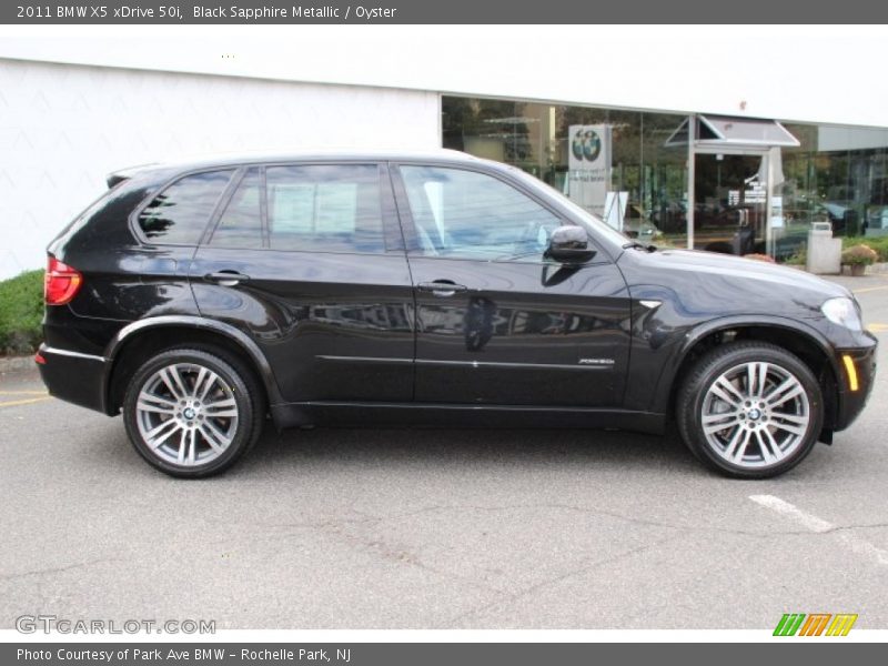 Black Sapphire Metallic / Oyster 2011 BMW X5 xDrive 50i