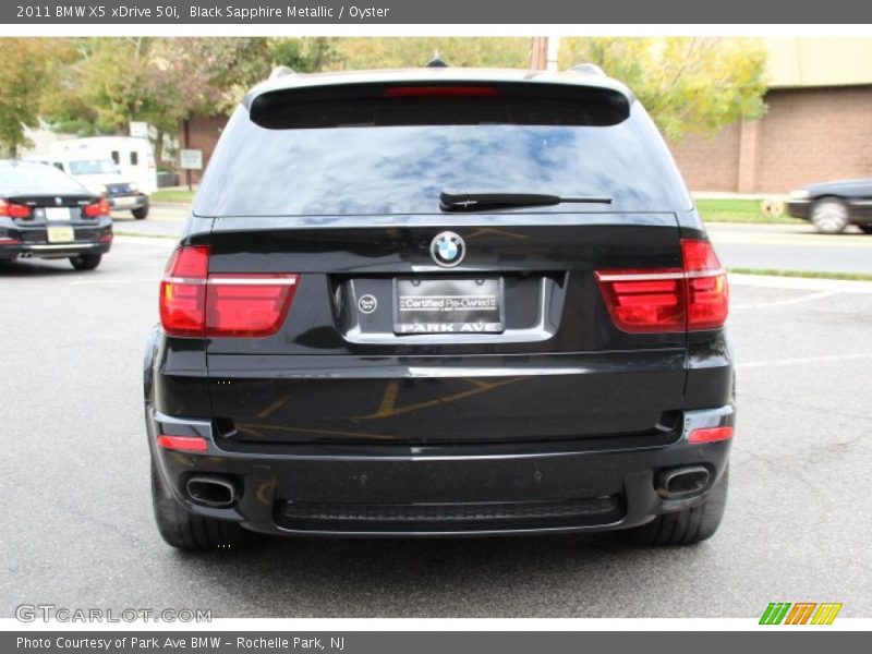 Black Sapphire Metallic / Oyster 2011 BMW X5 xDrive 50i