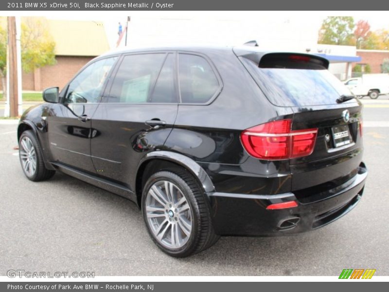 Black Sapphire Metallic / Oyster 2011 BMW X5 xDrive 50i