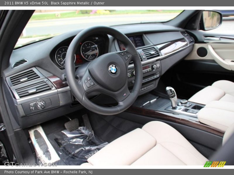 Black Sapphire Metallic / Oyster 2011 BMW X5 xDrive 50i
