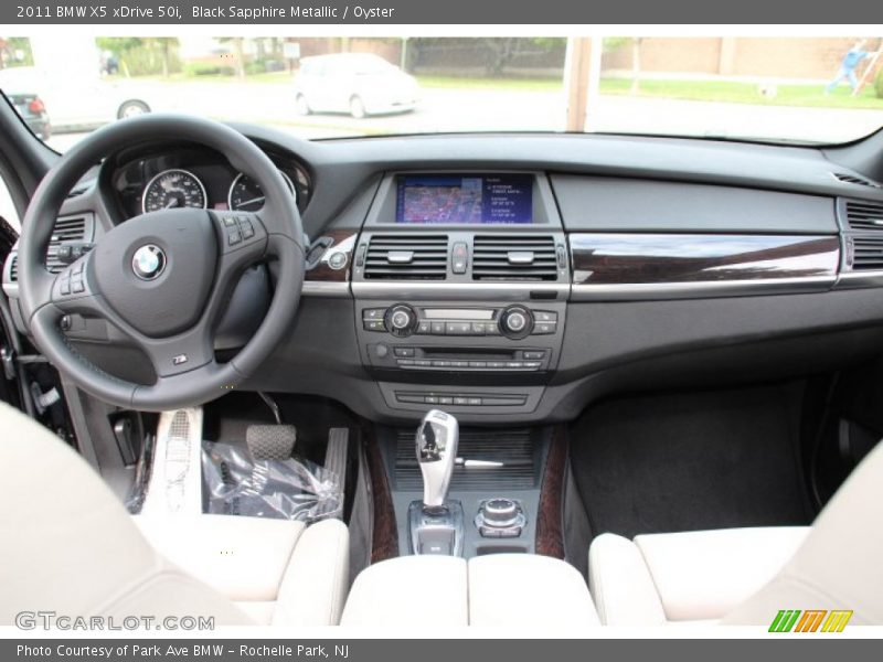 Black Sapphire Metallic / Oyster 2011 BMW X5 xDrive 50i