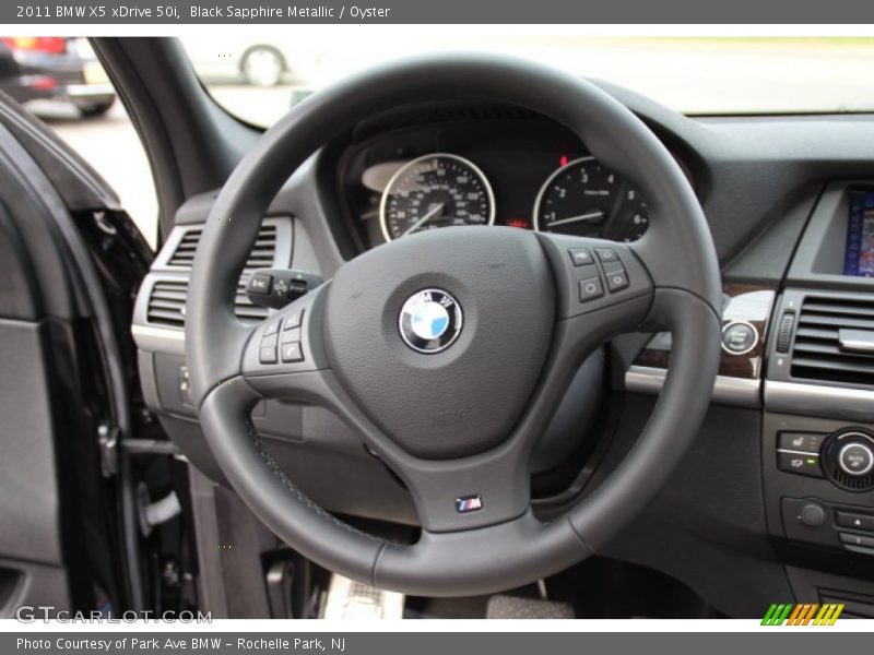 Black Sapphire Metallic / Oyster 2011 BMW X5 xDrive 50i