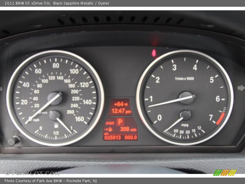 Black Sapphire Metallic / Oyster 2011 BMW X5 xDrive 50i