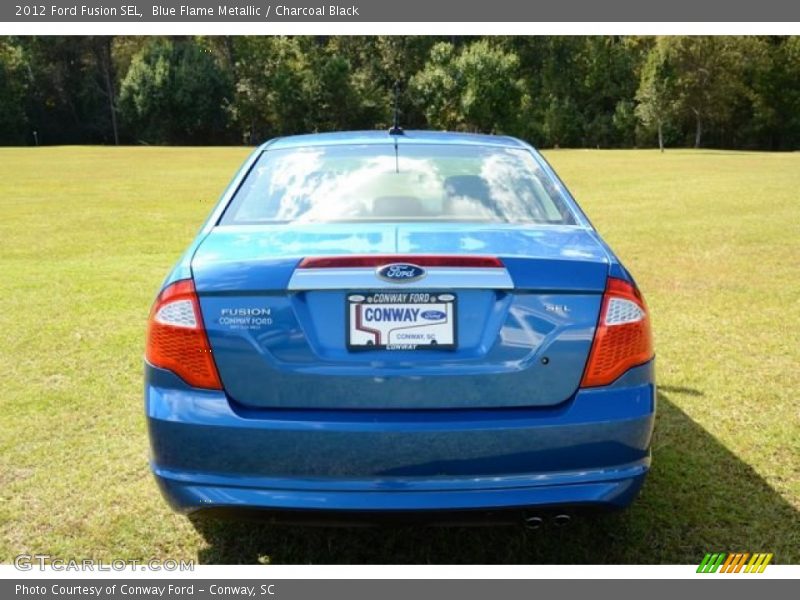 Blue Flame Metallic / Charcoal Black 2012 Ford Fusion SEL