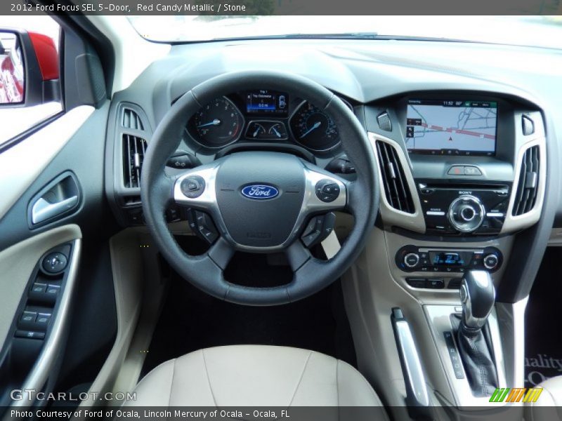 Red Candy Metallic / Stone 2012 Ford Focus SEL 5-Door
