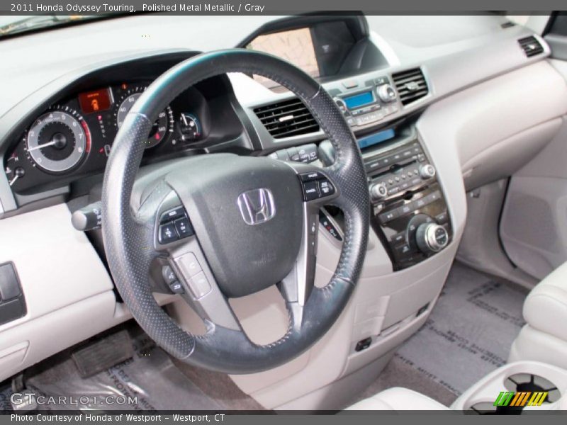 Polished Metal Metallic / Gray 2011 Honda Odyssey Touring