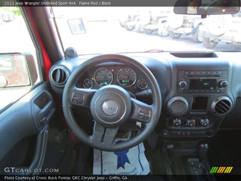 Flame Red / Black 2011 Jeep Wrangler Unlimited Sport 4x4