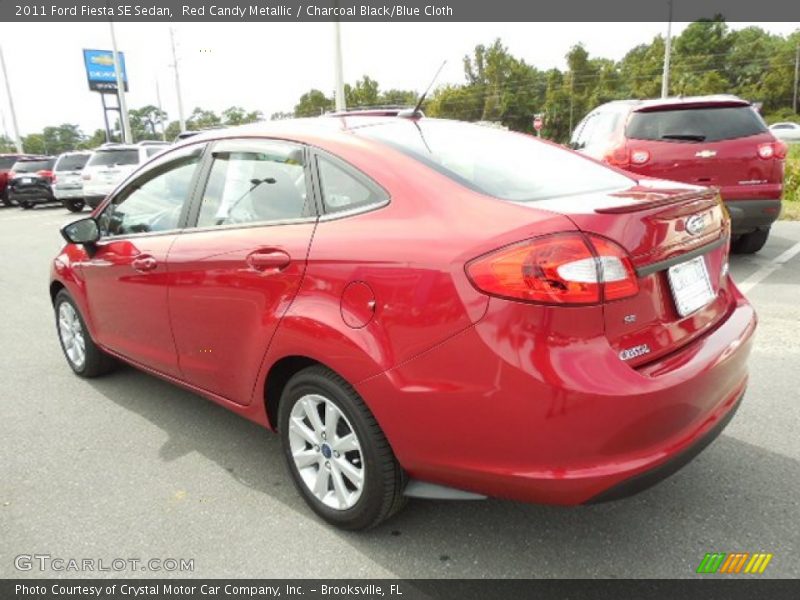 Red Candy Metallic / Charcoal Black/Blue Cloth 2011 Ford Fiesta SE Sedan