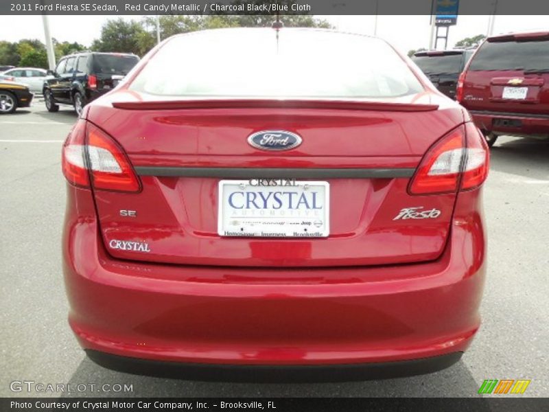 Red Candy Metallic / Charcoal Black/Blue Cloth 2011 Ford Fiesta SE Sedan