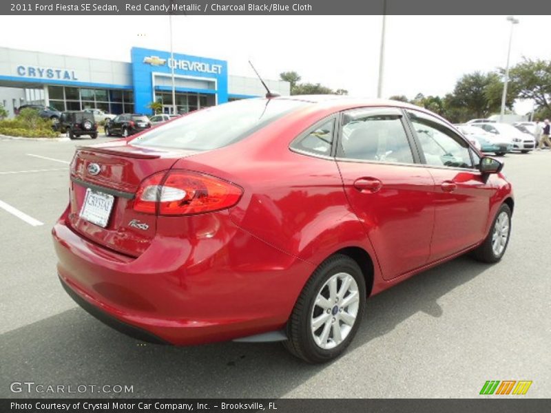 Red Candy Metallic / Charcoal Black/Blue Cloth 2011 Ford Fiesta SE Sedan