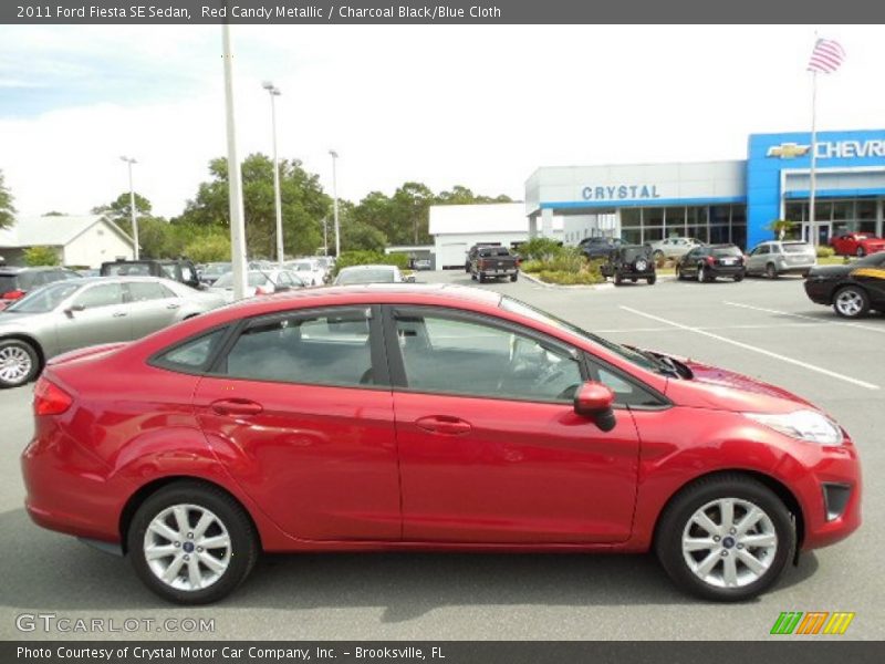 Red Candy Metallic / Charcoal Black/Blue Cloth 2011 Ford Fiesta SE Sedan