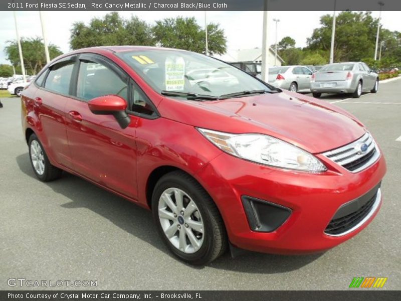 Red Candy Metallic / Charcoal Black/Blue Cloth 2011 Ford Fiesta SE Sedan