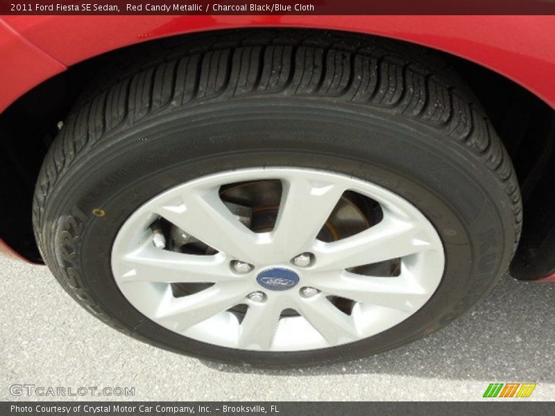 Red Candy Metallic / Charcoal Black/Blue Cloth 2011 Ford Fiesta SE Sedan