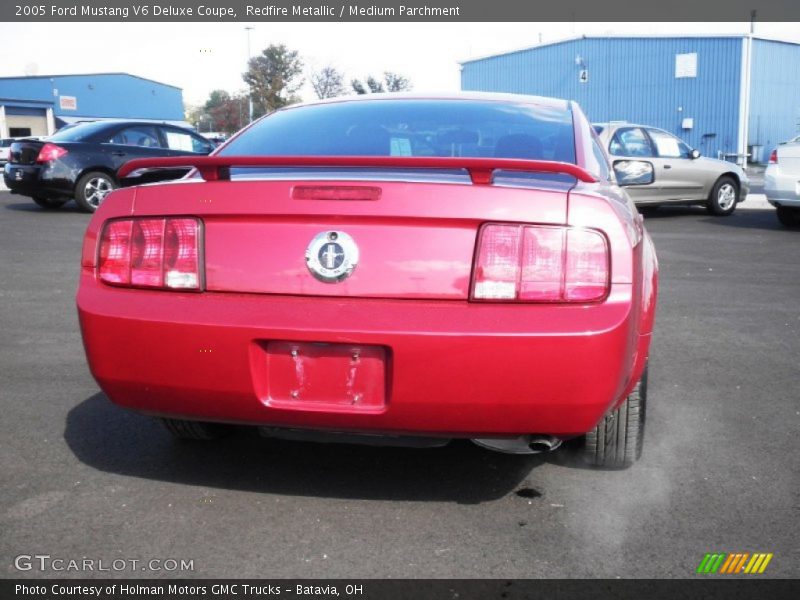Redfire Metallic / Medium Parchment 2005 Ford Mustang V6 Deluxe Coupe