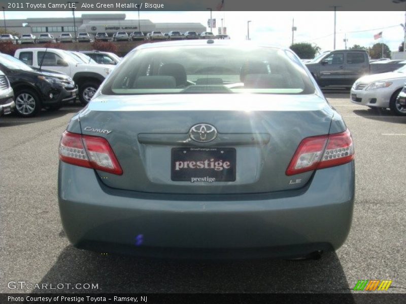 Aloe Green Metallic / Bisque 2011 Toyota Camry LE