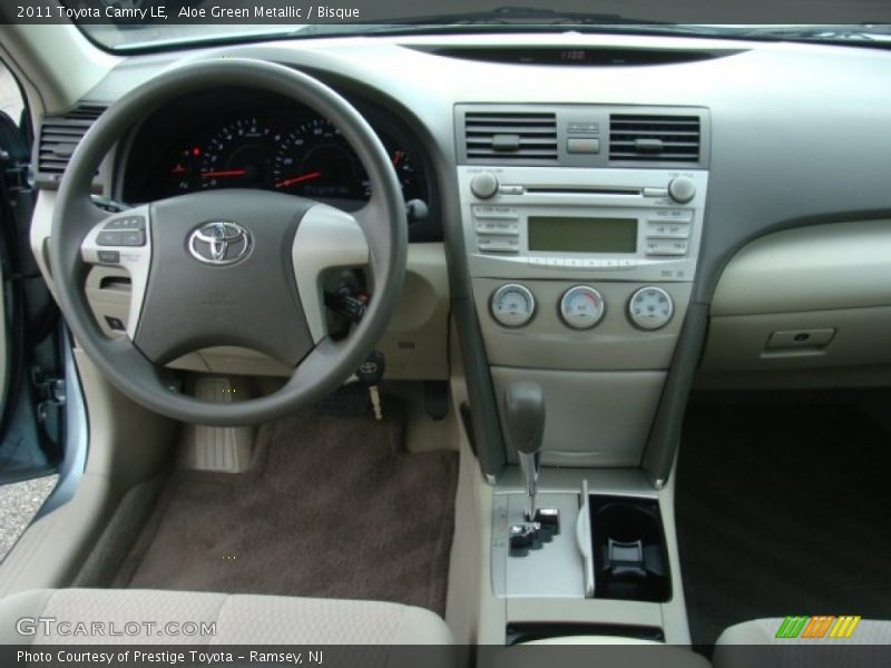 Aloe Green Metallic / Bisque 2011 Toyota Camry LE