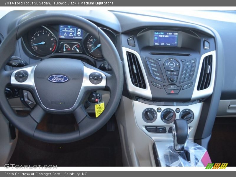 Tuxedo Black / Medium Light Stone 2014 Ford Focus SE Sedan