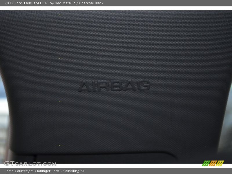 Ruby Red Metallic / Charcoal Black 2013 Ford Taurus SEL