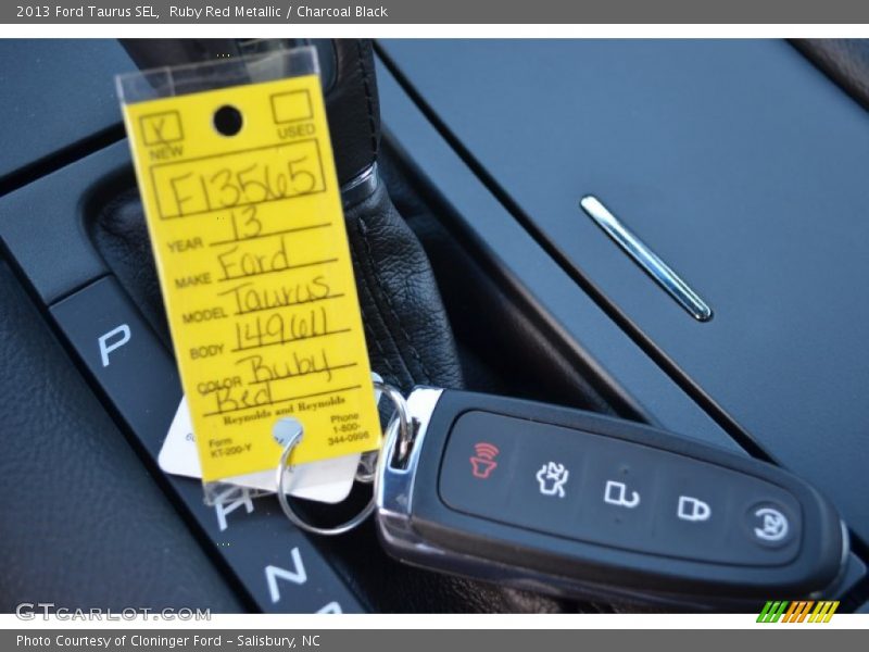 Ruby Red Metallic / Charcoal Black 2013 Ford Taurus SEL