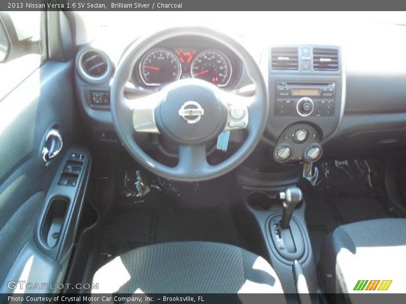 Brilliant Silver / Charcoal 2013 Nissan Versa 1.6 SV Sedan