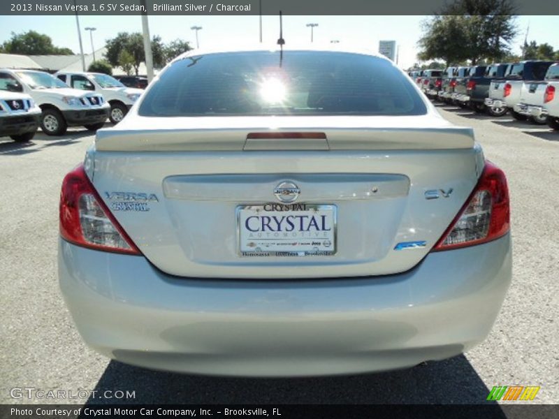 Brilliant Silver / Charcoal 2013 Nissan Versa 1.6 SV Sedan