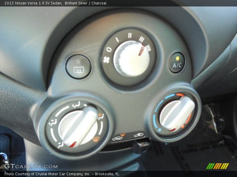 Brilliant Silver / Charcoal 2013 Nissan Versa 1.6 SV Sedan