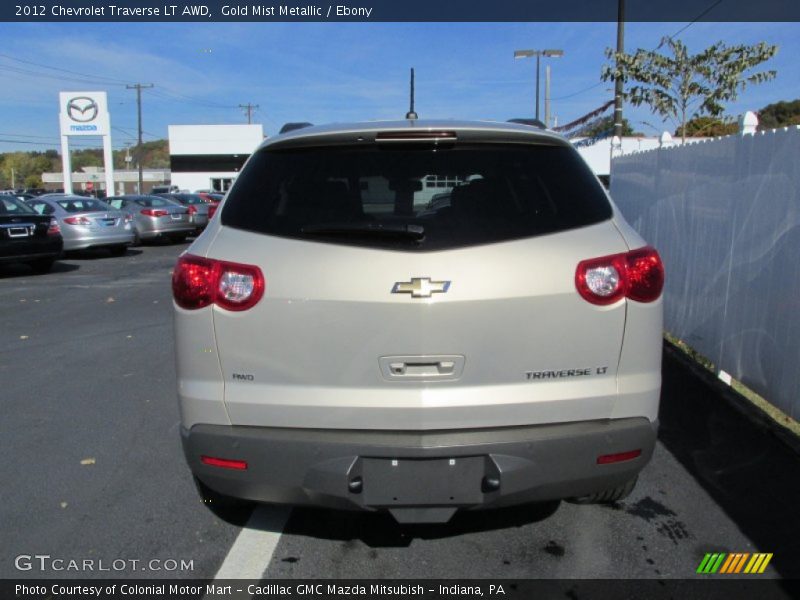 Gold Mist Metallic / Ebony 2012 Chevrolet Traverse LT AWD