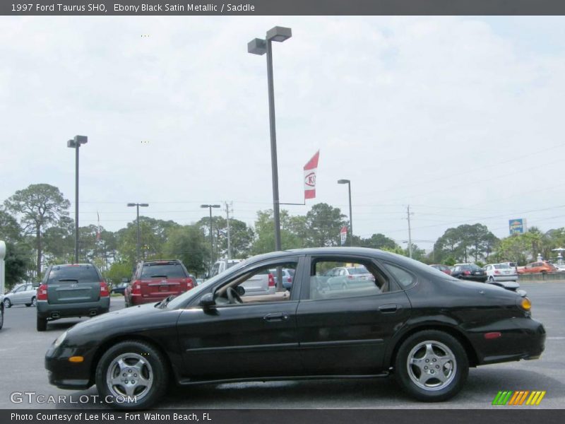 Ebony Black Satin Metallic / Saddle 1997 Ford Taurus SHO