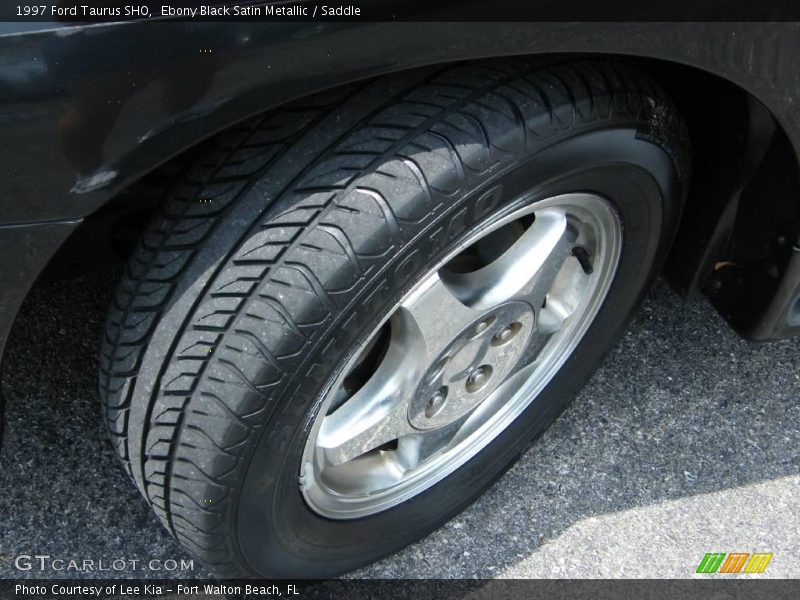 Ebony Black Satin Metallic / Saddle 1997 Ford Taurus SHO