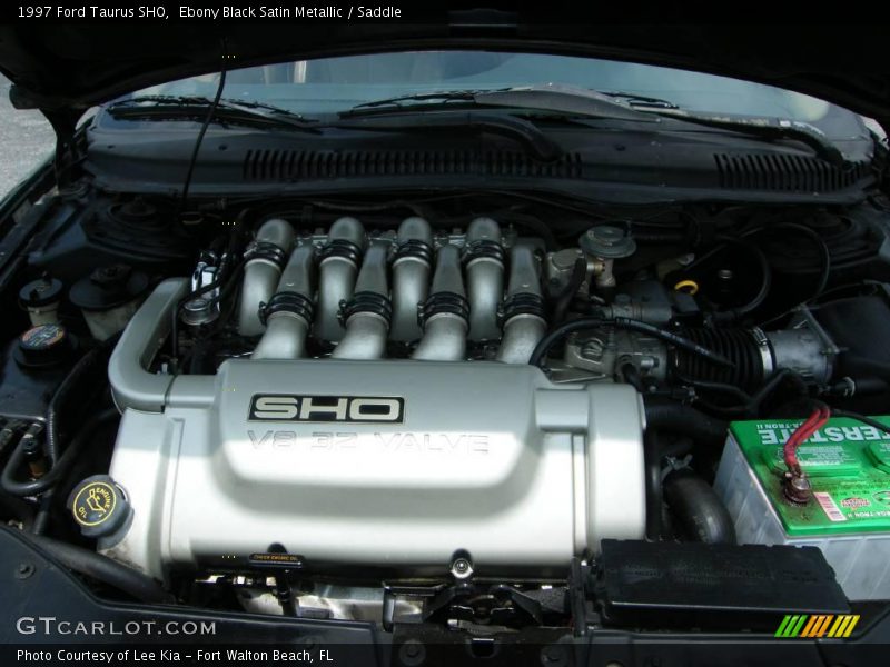 Ebony Black Satin Metallic / Saddle 1997 Ford Taurus SHO