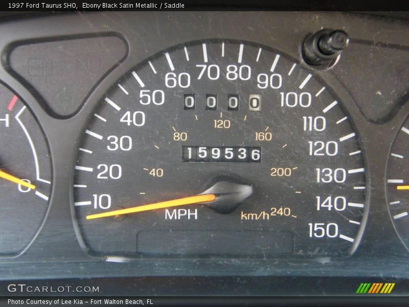 Ebony Black Satin Metallic / Saddle 1997 Ford Taurus SHO