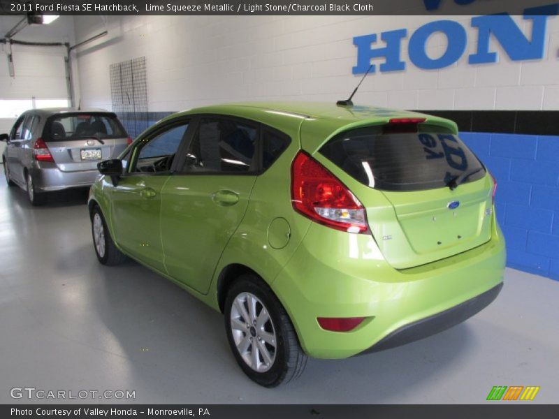 Lime Squeeze Metallic / Light Stone/Charcoal Black Cloth 2011 Ford Fiesta SE Hatchback