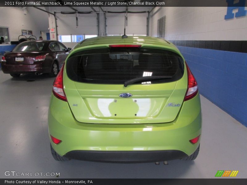 Lime Squeeze Metallic / Light Stone/Charcoal Black Cloth 2011 Ford Fiesta SE Hatchback