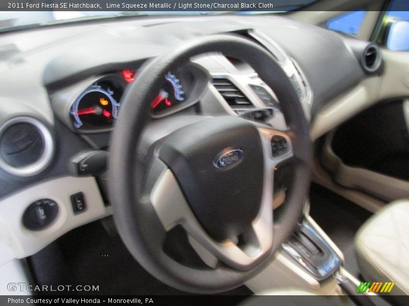 Lime Squeeze Metallic / Light Stone/Charcoal Black Cloth 2011 Ford Fiesta SE Hatchback