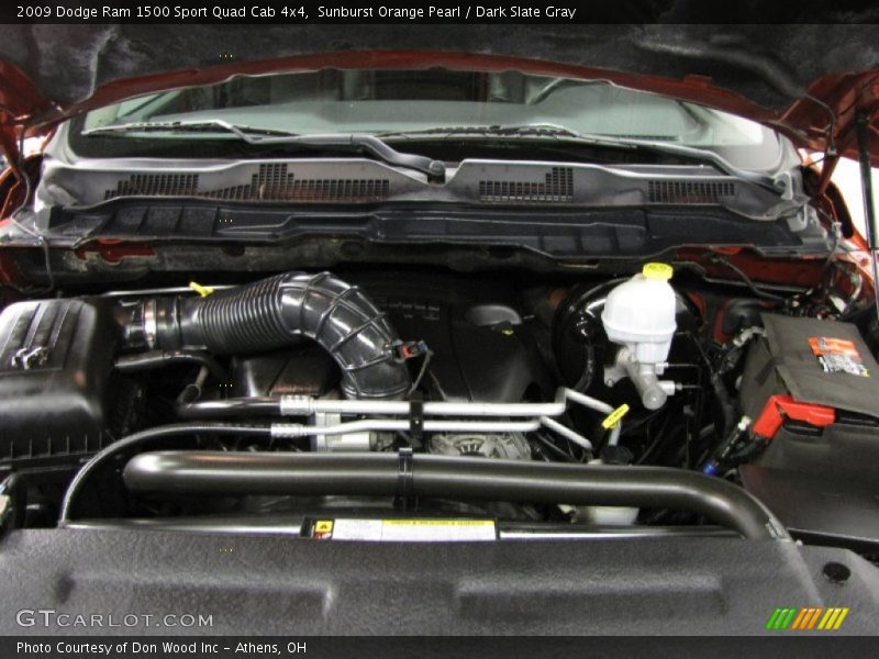 Sunburst Orange Pearl / Dark Slate Gray 2009 Dodge Ram 1500 Sport Quad Cab 4x4