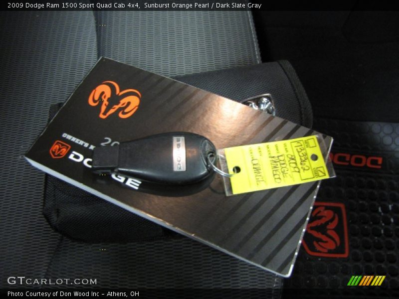 Sunburst Orange Pearl / Dark Slate Gray 2009 Dodge Ram 1500 Sport Quad Cab 4x4
