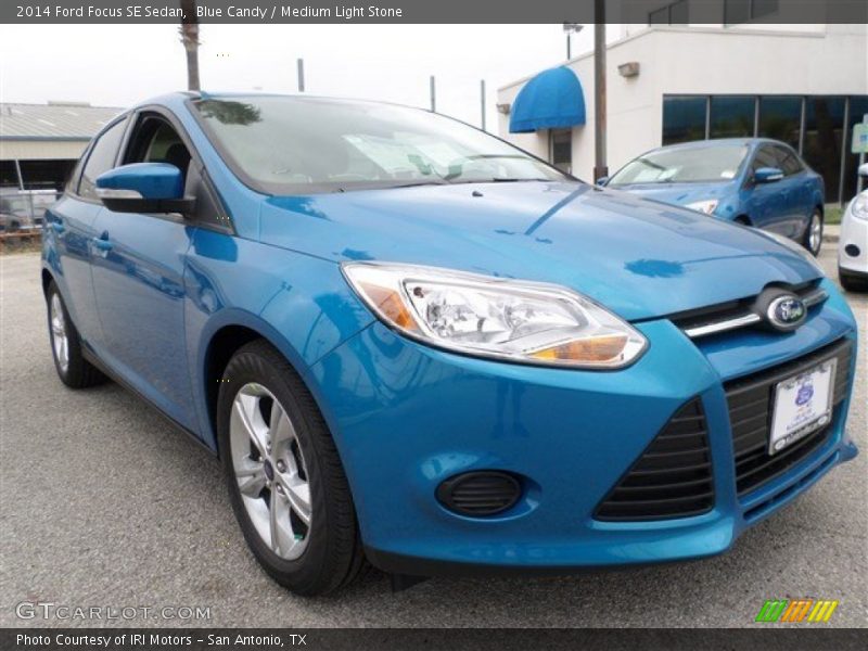 Blue Candy / Medium Light Stone 2014 Ford Focus SE Sedan