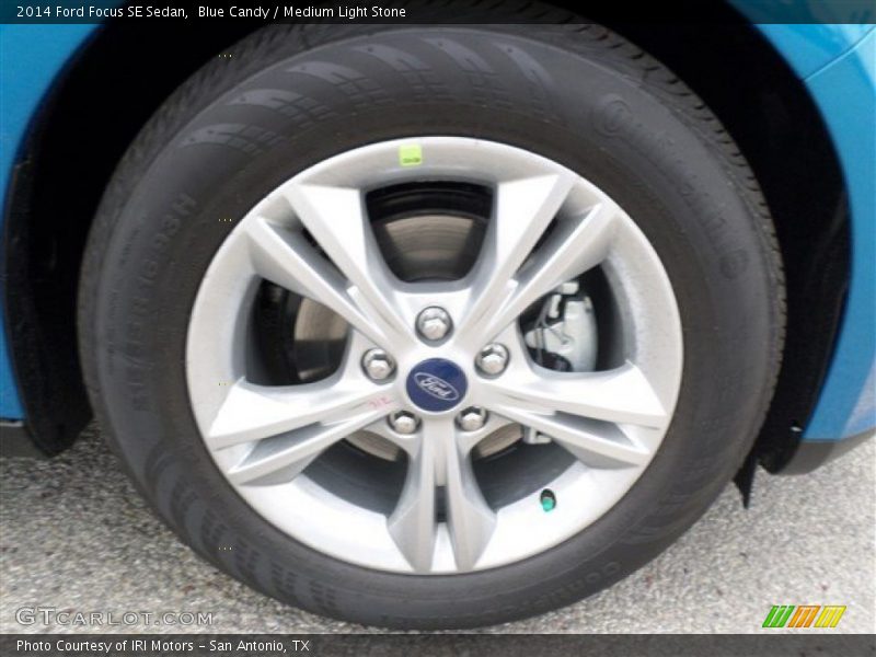 Blue Candy / Medium Light Stone 2014 Ford Focus SE Sedan