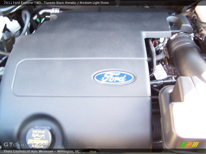 Tuxedo Black Metallic / Medium Light Stone 2011 Ford Explorer FWD