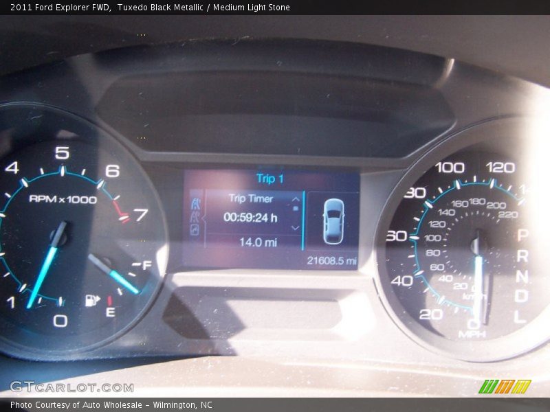 Tuxedo Black Metallic / Medium Light Stone 2011 Ford Explorer FWD