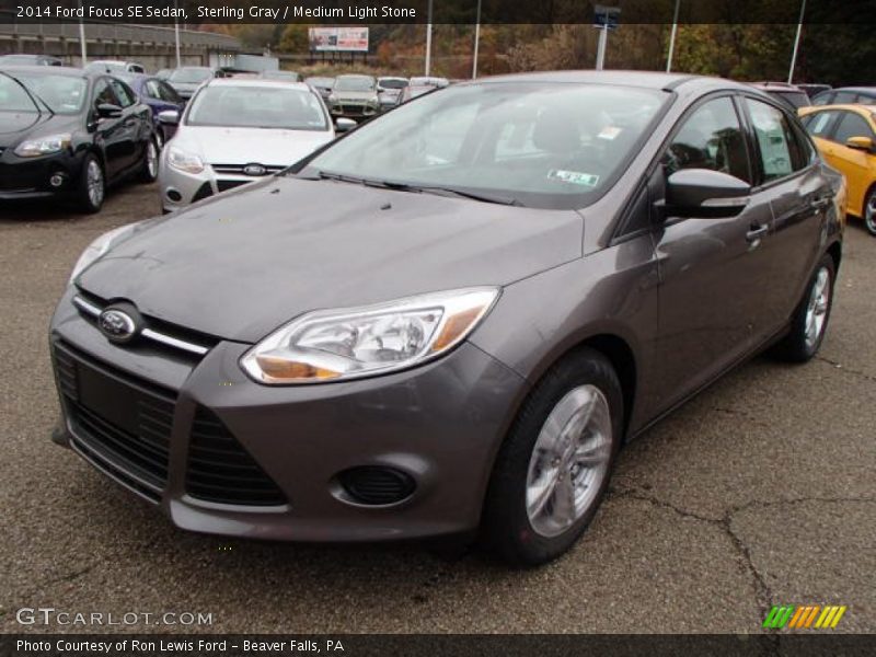 Sterling Gray / Medium Light Stone 2014 Ford Focus SE Sedan