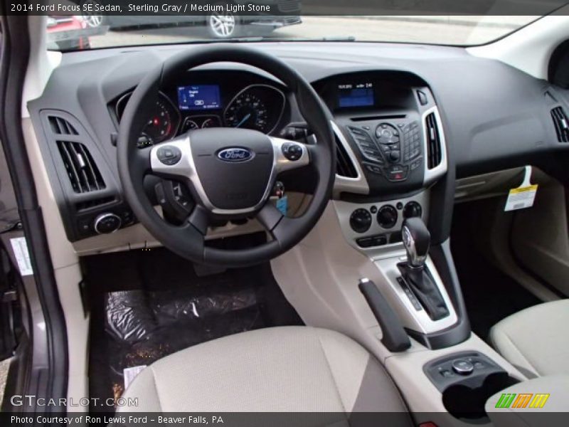 Sterling Gray / Medium Light Stone 2014 Ford Focus SE Sedan