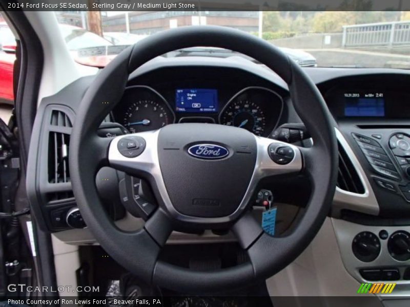 Sterling Gray / Medium Light Stone 2014 Ford Focus SE Sedan
